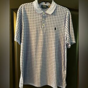 Ralph Lauren polo Men's size large. Blue with navy blue and white design.